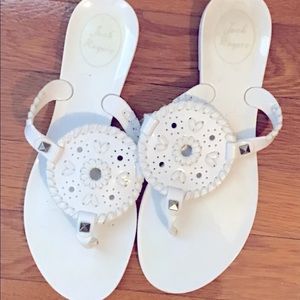 Jack Rogers white jelly shoes.